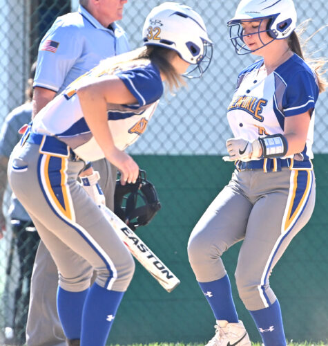 Lady Vikes hold on and advance